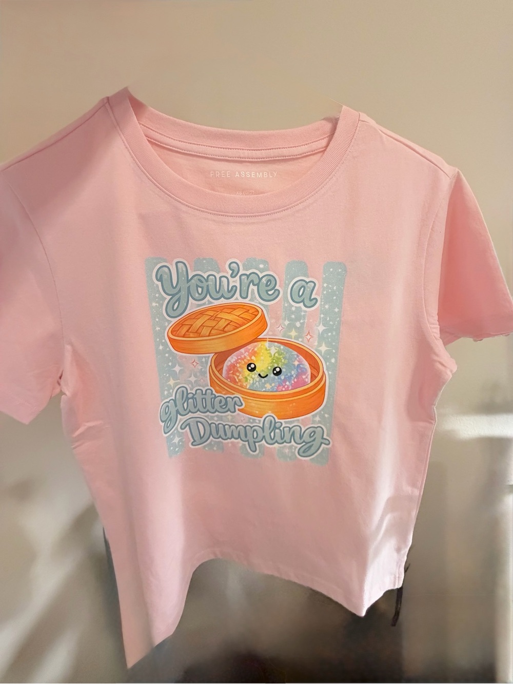 Kids "You're a Glitter Dumpling" Pink Tee
Free assembly women’s XS/ youth 7/8
